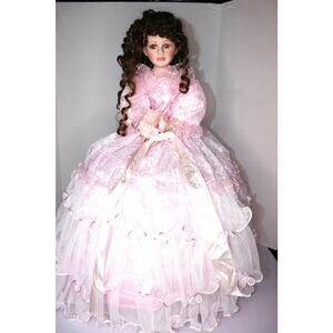 quinceañera doll is umbrella design in great condition 28" tall